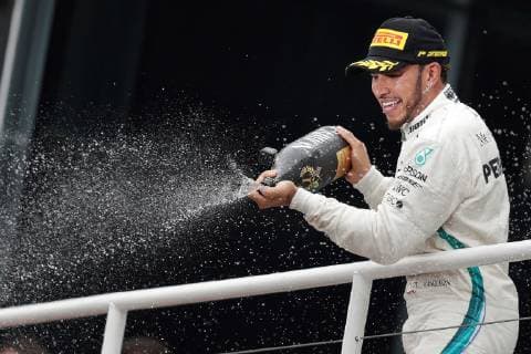 British driver Lewis Hamilton of Mercedes celebrates after the Brazilian Grand Prix, in Sao Paulo, Brazil, 11 November 2018. Hamilton (Mercedes), five times champion of the world, won on Sunday the Brazilian Grand Prix, the penultimate round of the Formula One World Championship WM Weltmeisterschaft which took place at the Interlagos circuit in Sao Paulo, where his team mathematically secured its fifth World Cup followed of builders. Hamilton achieved his 72nd victory in F1 by winning ahead of Dutch Max Verstappen (Red Bull) and Finnish Kimi Raikkonen (Ferrari). Formula One Grand Prix of Brazil !ACHTUNG: NUR REDAKTIONELLE NUTZUNG!  Copyright: xFernandoxBizerrax AME2607 20181111-636775708715284390