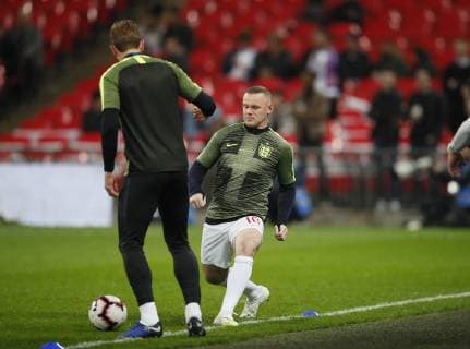 Wayne Rooney of England tackles Harry Kane of England during the warm up before the Friendly international match Länderspiel at Wembley Stadium, London. Picture date: 15th November 2018. Picture credit should read: David Klein Sportimage EDITORIAL USE ONLY. No use with unauthorised audio, video, data, fixture lists, club league logos or live services. Online in-match use limited to 120 images, no video emulation. No use in betting, games or single club league player publications. _K2I4733.JPG