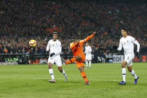 (L-R) Presnel Kimpembe of France, Georginio Wijnaldum of Holland, Raphael Varane of France during the UEFA Nations League A group 1 qualifying match between The Netherlands and France at stadium De Kuip on November 16, 2018 in Rotterdam, The Netherlands UEFA Nations League A group 1 2018 2019 xVIxVIxImagesx xMauricexvanxSteenxIVx 12797815