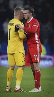 Wales v Denmark UEFA Nations League Gareth Bale of Wales and Kasper Schmeichel of Denmark during the UEFA Nations League match at the Cardiff City Stadium, Cardiff Content Not Available For UK Newspapers Copyright: xMikexGriffithsx FIL-12563-0032