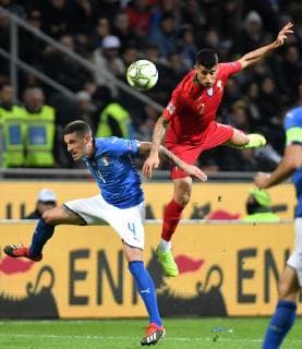 Fußball, Nations League, Italien - Portugal Cristiano Biraghi of Italy and Joao Cancelo of Portugal compete for the ball during the Nations League League A group 3 football match between Italy and Portugal at stadio Giuseppe Meazza, Milano, November, 17, 2018 Foto Andrea Staccioli Insidefoto andreaxstaccioli