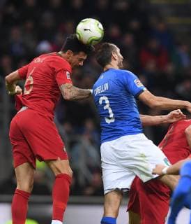 (181118) -- MILAN, Nov. 18, 2018 -- Italy s Giorgio Chiellini (R) vies with Portugal s Jose Fonte during the UEFA Nations League soccer match between Italy and Portugal in Milan, Italy, Nov. 17, 2018. The match ended with a 0-0 draw. ) (SP)ITALY-MILAN-FOOTBALL-UEFA NATIONS LEAGUE-ITA VS POR AlbertoxLingria 