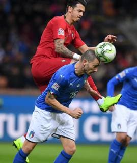 (181118) -- MILAN, Nov. 18, 2018 -- Italy s Leonardo Bonucci (R) vies with Portugal s Jose Fonte during the UEFA Nations League soccer match between Italy and Portugal in Milan, Italy, Nov. 17, 2018. The match ended with a 0-0 draw. ) (SP)ITALY-MILAN-FOOTBALL-UEFA NATIONS LEAGUE-ITA VS POR AlbertoxLingria 