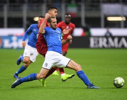 (181118) -- MILAN, Nov. 18, 2018 -- Italy s Giorgio Chiellini (R) vies with Portugal s Andre Silva during the UEFA Nations League soccer match between Italy and Portugal in Milan, Italy, Nov. 17, 2018. The match ended with a 0-0 draw. ) (SP)ITALY-MILAN-FOOTBALL-UEFA NATIONS LEAGUE-ITA VS POR AlbertoxLingria 