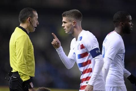 Referee Cuneyt Cakir and US Christian Pulisic pictured during a friendly soccer game between Italy and USA in Genk, Tuesday 20 November 2018. YORICKxJANSENS  x05473667x