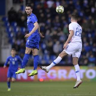 Italian Kevin Lasagna and US Aaron Long fight for the ball during a friendly soccer game between Italy and USA in Genk, Tuesday 20 November 2018. YORICKxJANSENS  x05473678x