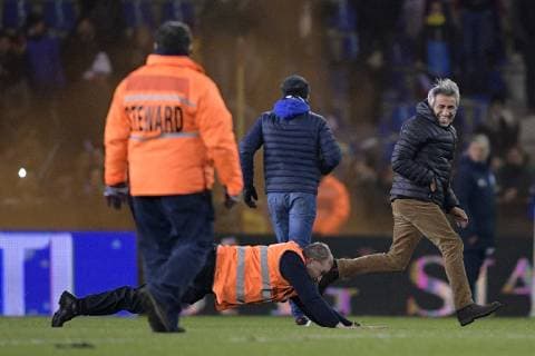 Illustration picture shows stewards chasing an Italian supporter who invaded the pitch after a friendly soccer game between Italy and USA in Genk, Tuesday 20 November 2018. YORICKxJANSENS  x05473736x