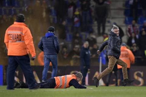 Illustration picture shows stewards chasing an Italian supporter who invaded the pitch after a friendly soccer game between Italy and USA in Genk, Tuesday 20 November 2018. YORICKxJANSENS  x05473737x