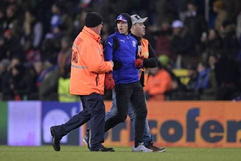 Illustration picture shows stewards chasing an Italian supporter who invaded the pitch after a friendly soccer game between Italy and USA in Genk, Tuesday 20 November 2018. YORICKxJANSENS  x05473738x