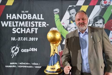 Andreas Michelmann President German Handball Federation poses with the IHF World Cup Trophy Trophy Press Conference Ó50 days until the Handball World Championship 2019Ó on 21 11 2018 in Munich