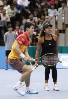 Tennis: Osaka, Nishikori play in charity match Japan s Kei Nishikori (front) and Naomi Osaka play a charity mixed doubles tennis match in Nagoya, central Japan, on Nov. 25, 2018. 