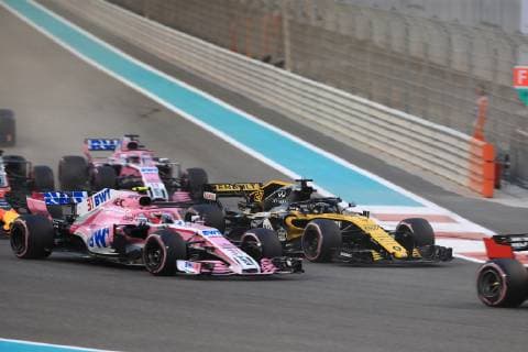 25th November 2018, Yas Marina, Abu Dhabi, United Arab Emirates; Etihad Airways Formula 1 Grand Prix of Abu Dhabi, race day; Renault F1 Team, Nico Hulkenberg makes a move on Racing Point Force India, Esteban Ocon  ActionPlus12082946 LeannexBoon