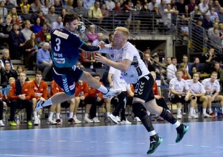 25 11 2018 xlakx EHF Cup 3 round Fuechse Berlin Aalborg Handbold emspor v l Fabian Wiede Fuechse Berlin 3 Aleksander Selmar Aalborg Handbold 2 Berlin