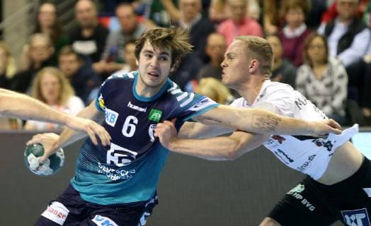 25 11 2018 Handball EHF Cup 3 Round 6 Matchday Fuechse Berlin Aalborg Handbold Picture Jacob Tandrup Holm Fuechse Berlin vs. Omar Ingi Magnusson Aalborg Handbold Handball EHF Cup 3 Round 6 Matchday Fuechse Berlin Aalborg Handbold