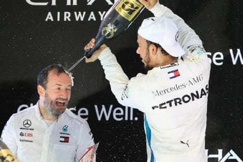 25th November 2018, Yas Marina, Abu Dhabi, United Arab Emirates; Etihad Airways Formula 1 Grand Prix of Abu Dhabi, race day; Mercedes AMG Petronas Motorsport, Lewis Hamilton wins the race and celebrates with team  ActionPlus12083010 Octane