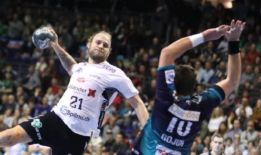 25 11 2018 Handball EHF Cup 3 Round 6 Matchday Fuechse Berlin Aalborg Handbold Picture Henrik Mollgaard Jensen Aalborg Handbold against Jakov Gojun Fuechse Berlin Handball EHF Cup 3 Round 6 Matchday Fuechse Berlin Aalborg Handbold