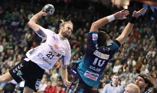 25 11 2018 Handball EHF Cup 3 Round 6 Matchday Fuechse Berlin Aalborg Handbold Picture Henrik Mollgaard Jensen Aalborg Handbold against Jakov Gojun Fuechse Berlin Handball EHF Cup 3 Round 6 Matchday Fuechse Berlin Aalborg Handbold
