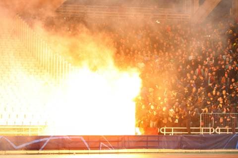 AEK Athens v Ajax Amsterdam UEFA Champions League A petrol bomb goes off in front of Ajax Amsterdam fans ahead of the UEFA Champions League match at Olympic Stadium, Athens Content Not Available For UK Newspapers Copyright: xYannisxHalasx FIL-12606-0004