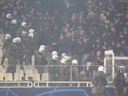 AEK Athens v Ajax Amsterdam UEFA Champions League Riot police charge towards fans of Ajax Amsterdam during the UEFA Champions League match at Olympic Stadium, Athens Content Not Available For UK Newspapers Copyright: xYannisxHalasx FIL-12606-0010