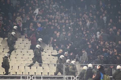 AEK Athens v Ajax Amsterdam UEFA Champions League Riot police charge towards fans of Ajax Amsterdam during the UEFA Champions League match at Olympic Stadium, Athens Content Not Available For UK Newspapers Copyright: xYannisxHalasx FIL-12606-0013