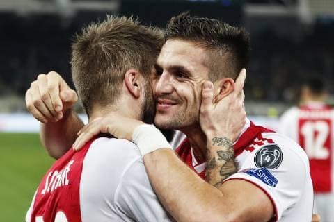 ATHENS, Olympic Stadium, AEK Athens FC - Ajax , football, Champions League, season 2018-2019, 27-11-2018, Ajax player Dusan Tadic (R) celebrating his 0-1 with Ajax player Lasse SchÅ¡ne (L) during the game AEK Athens - Ajax . AEK Athens - Ajax  x2649820x