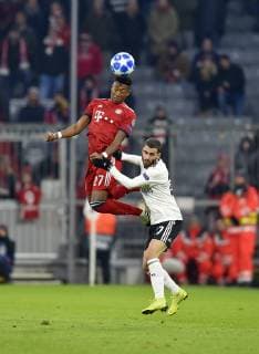 27 11 2018 Football UEFA Champions League 2018 2019 Group stage 5 Matchday FC Bayern Munich Benfica Lisbon in the Allianz Arena Munich v l David Alaba FC Bayern Munich v l Rafa Silva Lisbon DFL and DFB regulations prohibit any use of photographs as image sequences and or quasi video
