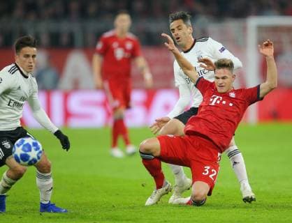 SOCCER - UEFA CL, Bayern vs Benfica MUNICH,GERMANY,27.NOV.18 - SOCCER - UEFA Champions League, FC Bayern Muenchen vs Benfica Lissabon. Image shows Franco Cervi (Benfica), Joshua Kimmich (Bayern) and Jonas (Benfica). GEPAxpictures xThomasxBachun