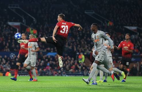 Nemanja Matic of Manchester United ManU leaps up to try and connectduring the UEFA Champions League match at Old Trafford, Manchester. Picture date 27th November 2018. Picture credit should read: Matt McNulty Sportimage EDITORIAL USE ONLY. No use with unauthorised audio, video, data, fixture lists, club league logos or live services. Online in-match use limited to 120 images, no video emulation. No use in betting, games or single club league player publications.