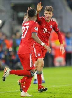 SOCCER - UEFA CL, Bayern vs Benfica MUNICH,GERMANY,27.NOV.18 - SOCCER - UEFA Champions League, FC Bayern Muenchen vs Benfica Lissabon. Image shows the rejoicing of David Alaba and Thomas Mueller (Bayern). GEPAxpictures xThomasxBachun