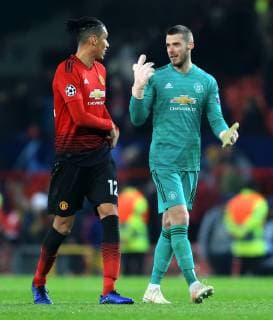 Manchester United ManU s David de Gea talks with Chris Smalling at full time during the UEFA Champions League match at Old Trafford, Manchester. Picture date 27th November 2018. Picture credit should read: Matt McNulty Sportimage EDITORIAL USE ONLY. No use with unauthorised audio, video, data, fixture lists, club league logos or live services. Online in-match use limited to 120 images, no video emulation. No use in betting, games or single club league player publications.