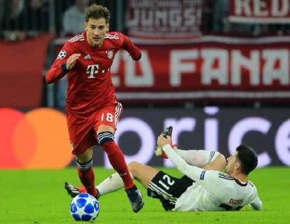 27 11 2018 Champions League Season 2018 2019 Bavaria vs Benfica Lisbon Allianz Arena Munich Sports in picture Leon Goretzka FCB past Pizzi Benfica DFL REGULATIONS PROHIBIT ANY USE OF PHOTOGRAPHS AS IMAGE SEQUENCES AND OR QUASI VIDEO