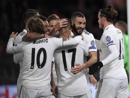 (181128) -- ROME, Nov. 28, 2018 -- Real Madrid s Lucas Vazquez (C) celebrates by his teammates during a group G match of UEFA Champions League between Roma and Real Madrid, in Rome, Italy, Nov. 27, 2018. Real Madrid won 2-0. ) (SP)ITALY-ROME-SOCCER-UEFA CHAMPIONS LEAGUE-ROMA VS REAL MADRID AlbertoxLingria 