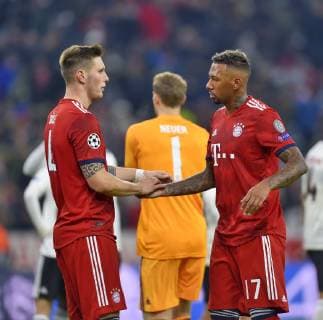 27 11 2018 Football UEFA Champions League 2018 2019 Group Phase 5 Matchday FC Bayern Munich Benfica Lisbon at Allianz Arena Munich v l Niklas Süle FC Bayern Munich shakhands with Jerome Boateng FC Bayern Munich DFL and DFB regulations prohibit any use of photographs as image sequences and or quasi video