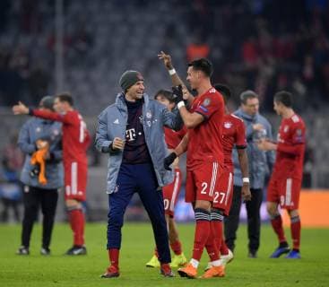 27 11 2018 Football UEFA Champions League 2018 2019 Group phase 5 matchday FC Bayern Munich Benfica Lisbon in the Allianz Arena Munich v left Thomas Müller FC Bayern Munich and Sandro Wagner FC Bayern Munich have fun together after the match DFL and DFB regulations prohibit any use of photographs as image sequences and or quasi video
