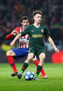 MADRID, SPAIN â€“ NOVEMBER 28, 2018: Atletico Madridâ€™s Stefan Savic (L) and AS Monacoâ€™s Alexander Golovin in their 2018 19 UEFA Champions League Group A Round 5 football match at Madridâ€™s Wanda Metropolitano. Stanislav Krasilnikov  TS09922E