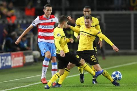 Club s Hans Vanaken, Dortmund s Christian Pulisic and Dortmund s Lukasz Piszczek fight for the ball during a game between Belgian soccer team Club Brugge KV and German team Borussia Dortmund in Dortmund, Germany, Wednesday 28 November 2018, on the fifth day of the UEFA Champions League, in group A. BRUNOxFAHY  x05478900x