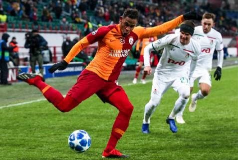 MOSCOW, RUSSIA â€“ NOVEMBER 28, 2018: Galatasaray Istanbulâ€™s Fernando, Lokomotiv Moscowâ€™s Igor Denisov and Maciej Rybus (L-R) in their 2018 19 UEFA Champions League Group D Round 5 football match at RZD Arena; Lokomotiv Moscow won 2-0. Mikhail Tereshchenko TASS  TS099252