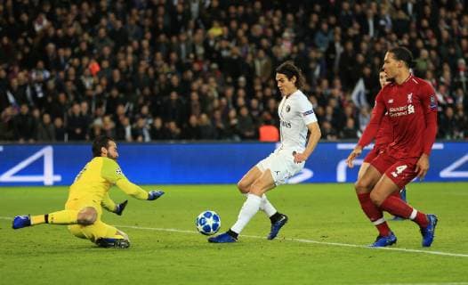 Edinson Cavani of Paris Saint-Germain has a shot saved by Liverpool s Alisson Becker during the UEFA Champions League Group C match at the Parc des Princes Stadium, Paris. Picture date: 28th November 2018. Picture credit should read: Matt McNulty Sportimage EDITORIAL USE ONLY. No use with unauthorised audio, video, data, fixture lists, club league logos or live services. Online in-match use limited to 120 images, no video emulation. No use in betting, games or single club league player publications. AD5T3596.JPG