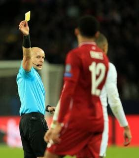 Liverpool s Joe Gomez is shown a yellow card during the UEFA Champions League Group C match at the Parc des Princes Stadium, Paris. Picture date: 28th November 2018. Picture credit should read: Matt McNulty Sportimage EDITORIAL USE ONLY. No use with unauthorised audio, video, data, fixture lists, club league logos or live services. Online in-match use limited to 120 images, no video emulation. No use in betting, games or single club league player publications. B69P4096.JPG