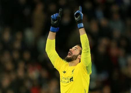 Liverpool s Alisson Becker celebrates after his teams first goal during the UEFA Champions League Group C match at the Parc des Princes Stadium, Paris. Picture date: 28th November 2018. Picture credit should read: Matt McNulty Sportimage EDITORIAL USE ONLY. No use with unauthorised audio, video, data, fixture lists, club league logos or live services. Online in-match use limited to 120 images, no video emulation. No use in betting, games or single club league player publications. B69P4222.JPG