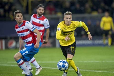 Football UEFA Champions League CL Season 2018 2019 5 Matchday Borussia Dortmund Club Bruges in Dortmund North Rhine-Westphalia Bruges Brandon Mechele l and Dortmunds Marco Reus fight for the ball UEFA REGULATIONS PROHIBIT ANY USE OF PHOTOGRAPHS AS IMAGE SEQUENCES AND OR QUASI VIDEO Copyright: xKirchner DavidxInderliedx