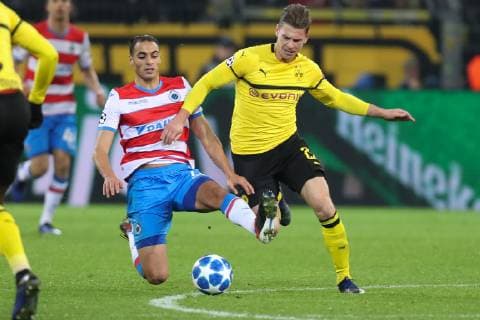 Club s Sofyan Amrabat and Dortmund s Lukasz Piszczek fight for the ball during a game between Belgian soccer team Club Brugge KV and German team Borussia Dortmund in Dortmund, Germany, Wednesday 28 November 2018, on the fifth day of the UEFA Champions League, in group A. BRUNOxFAHY  x05478917x