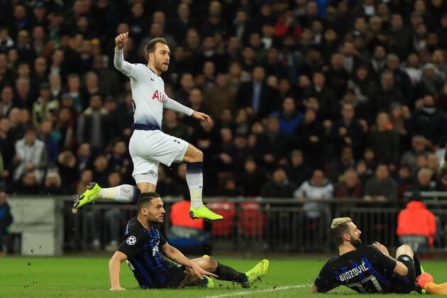 28th November 2018, Wembley Stadium, London England; UEFA Champions League football, Tottenham Hotspur versus Inter Milan; Christian Eriksen of Tottenham Hotspur hurdles over Danilo D Ambrosio of Internazionale as he scores the opening goal for 1-0 in the 80th minute  ActionPlus12083759 ShaunxBrooks