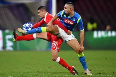 Dejan Joveljic of Crvena Zvezda and Nikola Maksimovic of Napoli compete for the ball during the Uefa Champions League 2018 2019 Group C football match betweenSSC Napoli and Crvena Zvezda at San Paolo stadium, Napoli, November, 28, 2018 Foto Andrea Staccioli Insidefoto AndreaxStaccioli