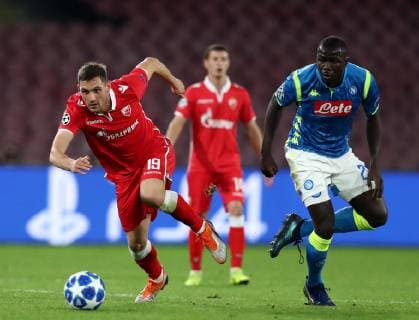 November 28, 2018 - Naples, Italy - SSC Napoli - FK Crvena zvezda : UEFA Champions League Group C .Nikola Stoiljkovic of Crvena Zvezda and Kalidou Koulibaly of Napoli at San Paolo Stadium in Naples, Italy on November 28, 2018. SSC Napoli v Red Star Belgrade - UEFA Champions League Group C  - ZUMAn230 20181128_zaa_n230_331 Copyright: xMatteoxCiambellix