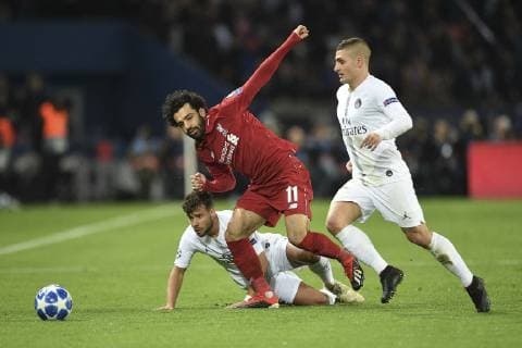 (181129) -- PARIS, Nov. 29, 2018 -- Juan Bernat (L) and Marco Verratti (R) of Paris Saint-Germain vies with Mohamed Salah of Liverpool during the UEFA Champions League group C match between Paris Saint-Germain and Liverpool in Paris, France on Nov. 28, 2018. Paris Sain-Germain won 2-1. ) (SP)FRANCE-PARIS-FOOTBALL-UEFA CHAMPIONS LEAGUE-PARIS SAINT-GERMAIN VS LIVERPOOL JackxChan 