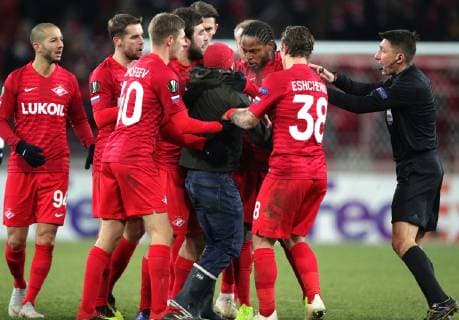 MOSCOW, RUSSIA - NOVEMBER 29, 2018: Spartak Moscow s players and a pitch invader in the 2018 19 UEFA Europa League Group G Round 5 football match against Rapid Vienna at Otkrytie Arena. Sergei Bobylev TASS  TS09947B