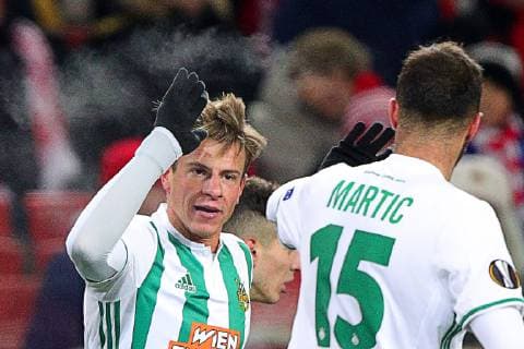 MOSCOW, RUSSIA - NOVEMBER 29, 2018: Rapid Vienna s Philipp Schobesberger (L) and Manuel Martic celebrate scoring in the 2018 19 UEFA Europa League Group G Round 5 football match against Spartak Moscow at Otkrytie Arena. Sergei Bobylev TASS  TS099483