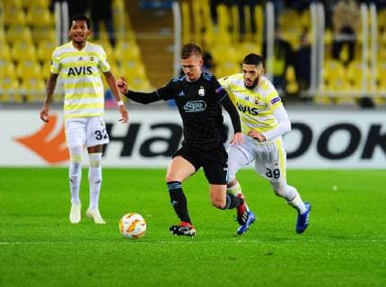 Yassine Benzia (R) of Fenerbahce and Dani Olmo 7 of Dinamo Zagreb during the UEFA Europa League groupD match between Fenerbahce and Dinamo Zagreb at Ulker Stadium in Istanbul , Turkey on November 29 , 2018. 