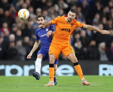 Chelsea s Cesc Fabregas tussles with Salonika s Yevhen Shakhov during the UEFA Europa League, Group L match at Stamford Bridge Stadium, London. Picture date: 29th November 2018. Picture credit should read: David Klein Sportimage EDITORIAL USE ONLY. No use with unauthorised audio, video, data, fixture lists, club league logos or live services. Online in-match use limited to 120 images, no video emulation. No use in betting, games or single club league player publications. SPI_03_DK_Chelsea_Salonika.jpg